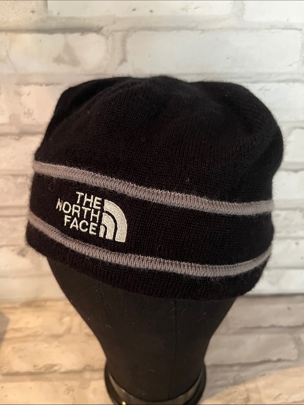 The North Face Black Beanie with Gray Trim and Logo hat
